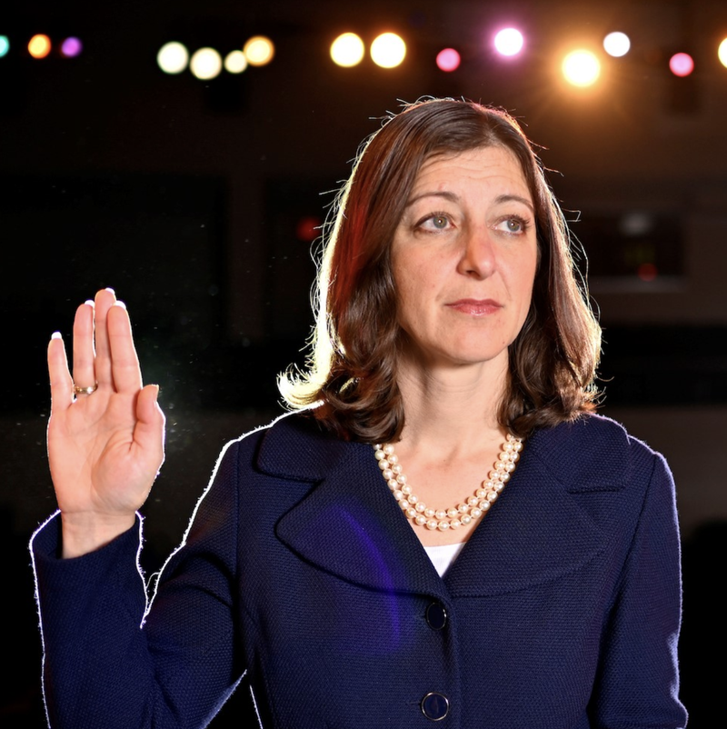 Elaine Luria with Hand Raised