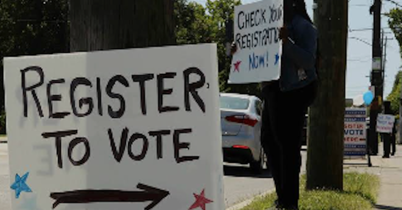 Paper Sign "Register to Vote"